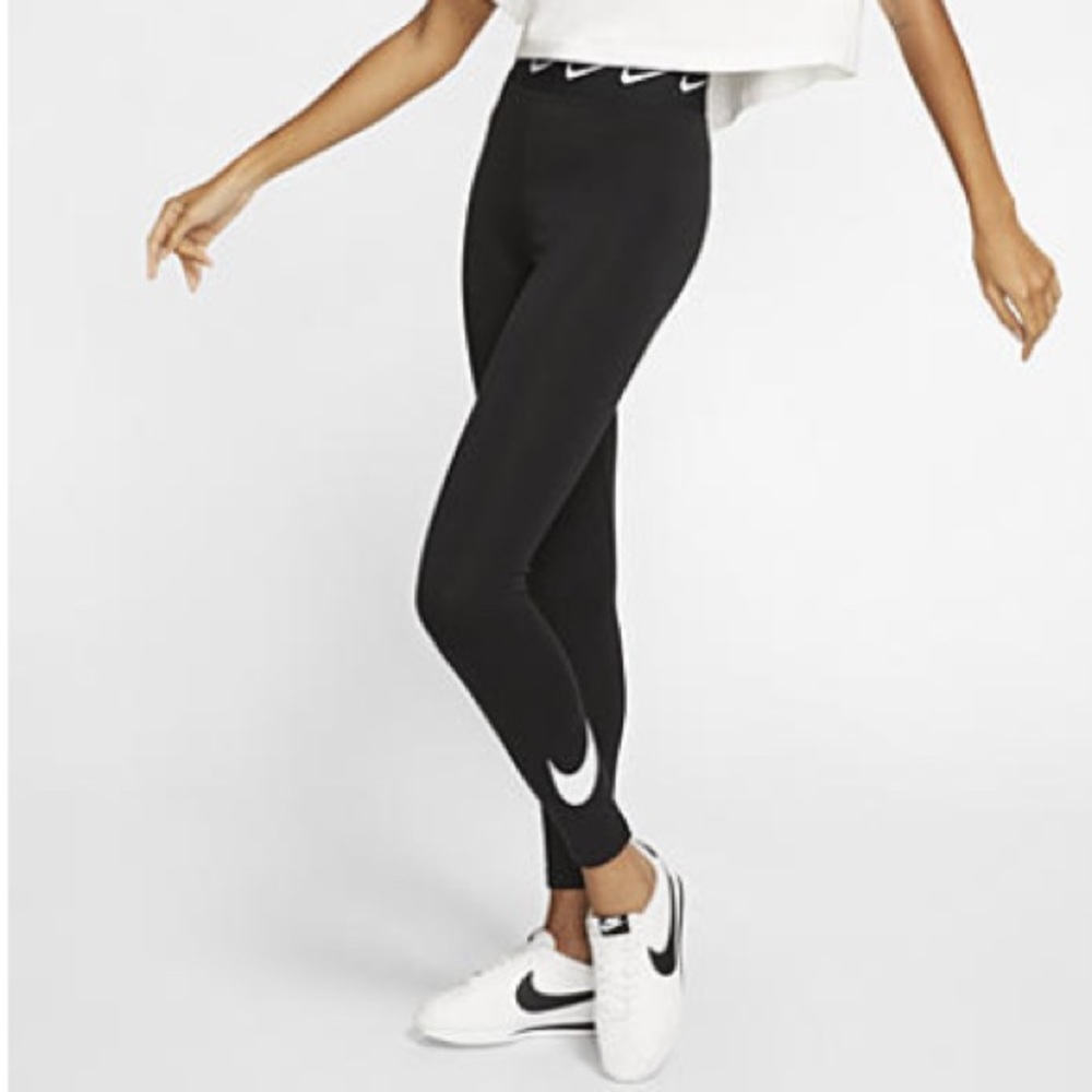 Black Nike leggings with white logo.